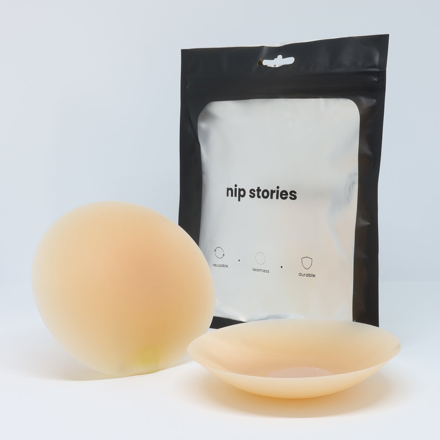 front view of nip stories 10 cm nude adhesive nipple covers in nz