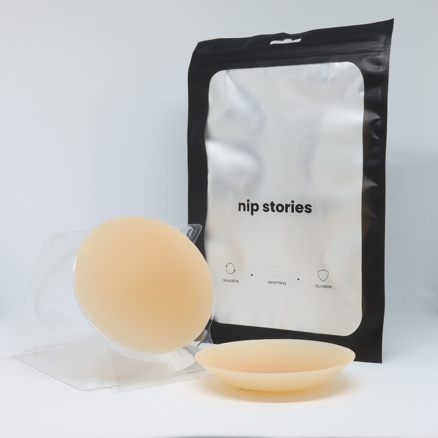front view of nip stories 10 cm nude non adhesive nipple covers in nz