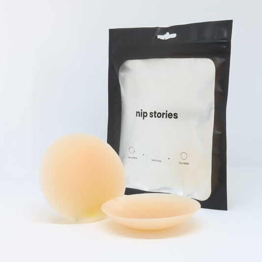 front view of nip stories 8 cm nude adhesive nipple covers in nz
