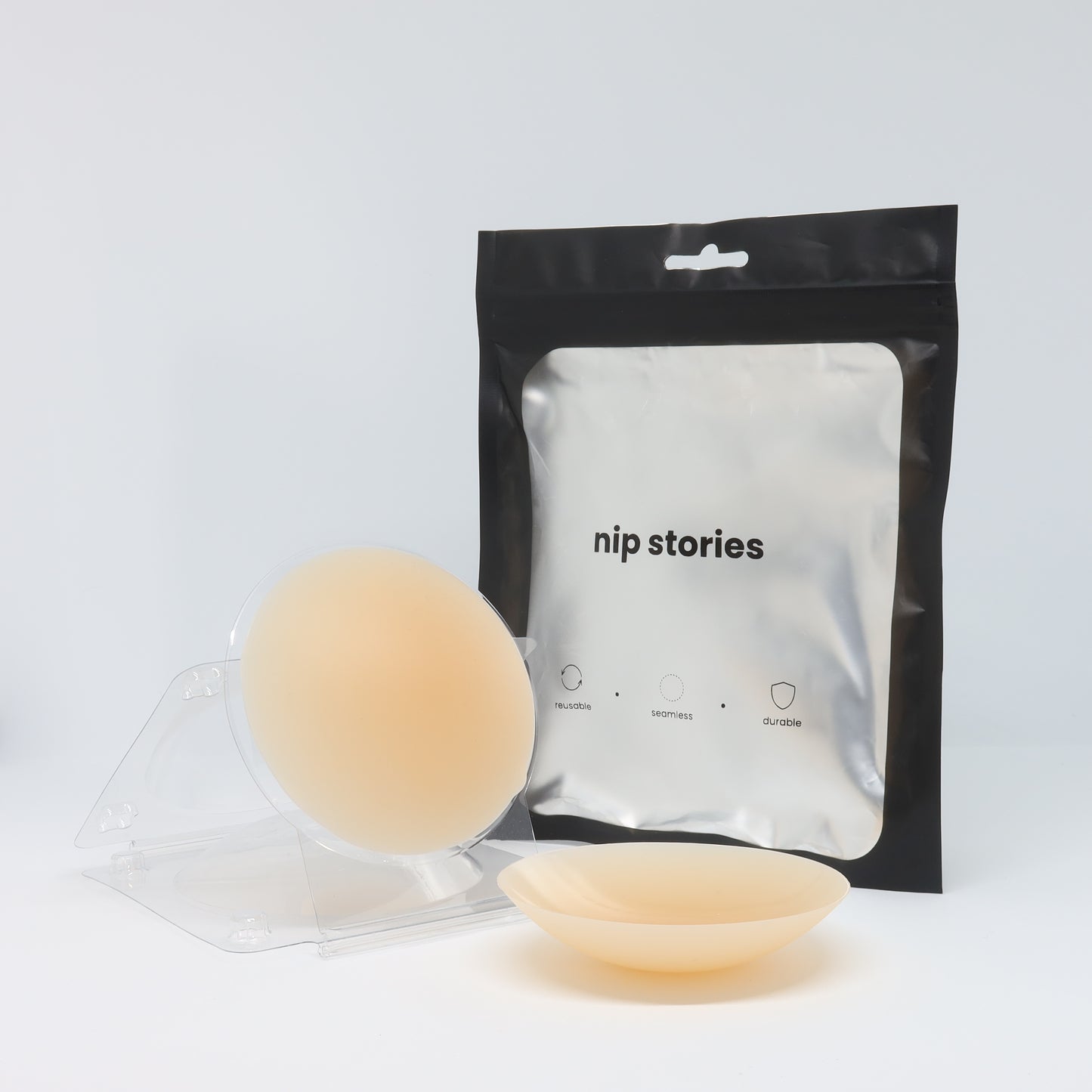 front view of nip stories 8 cm nude non adhesive nipple covers in nz