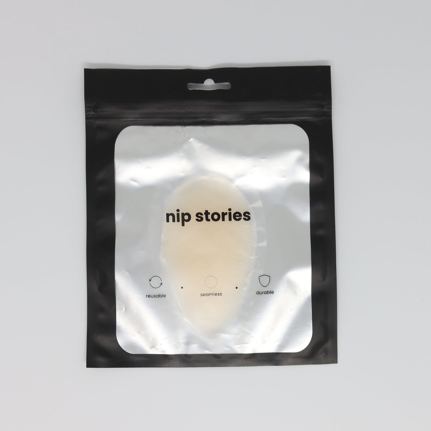 top view of nip stories small cameltoe concealer nz in packaging