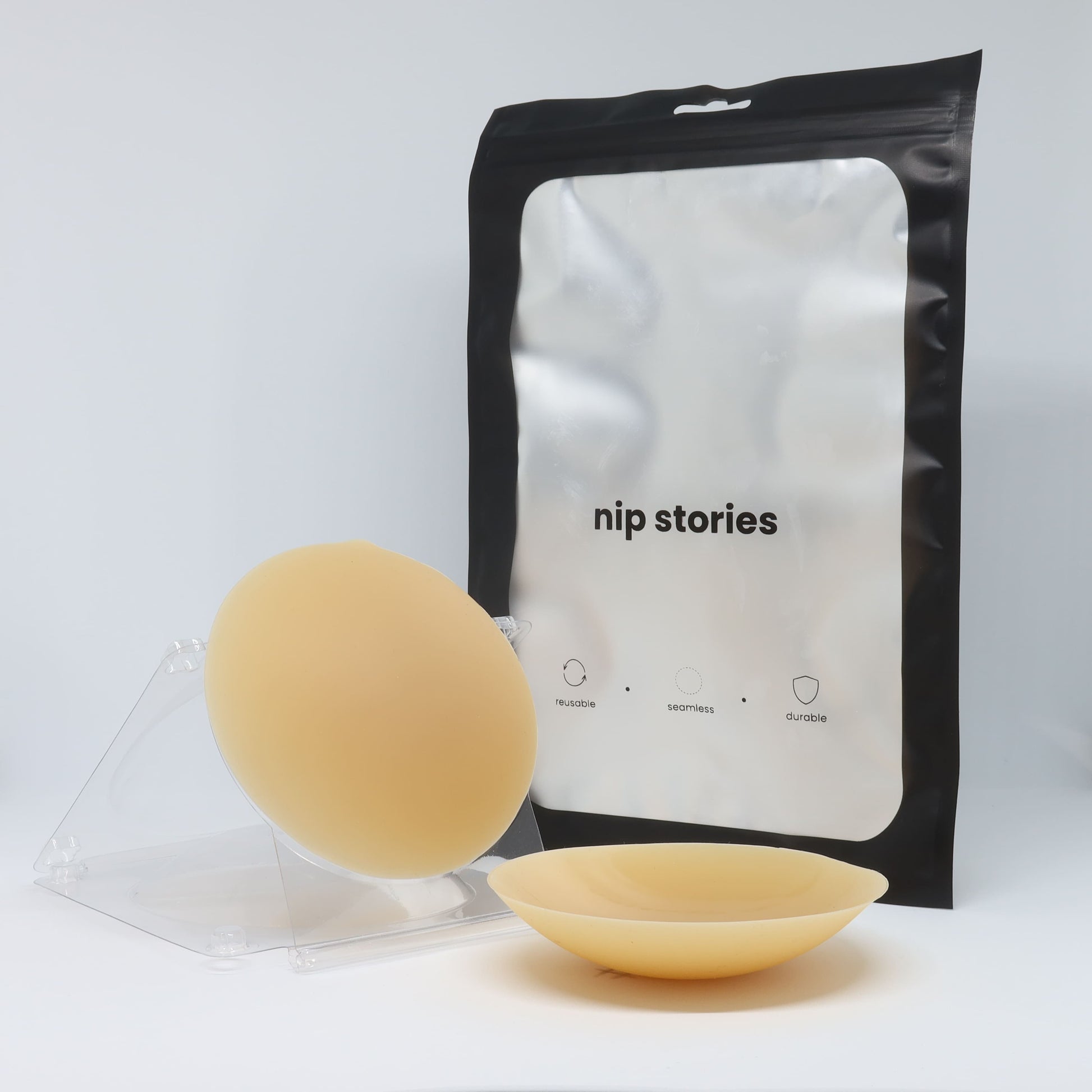 front view of nip stories 10 cm dark non adhesive nipple covers in nz