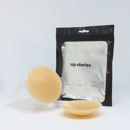 front view of nip stories 8 cm dark non adhesive nipple covers in nz