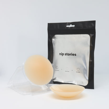 front view of nip stories 8 cm nude non adhesive nipple covers in nz